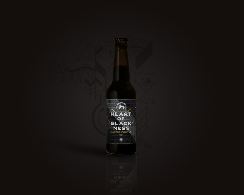 Heart of Blackness baltic porter bottle peers out of black background.