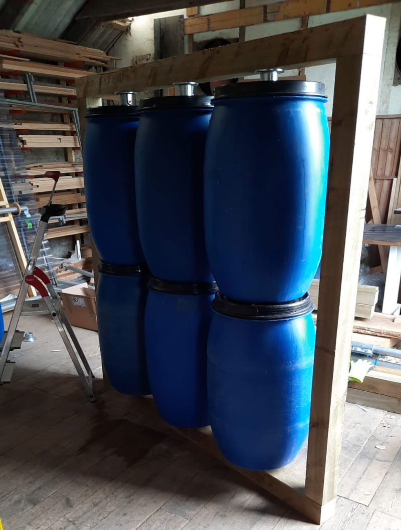 Six barrels in a 2x3 formation are joined to create a spinning barrel wall.